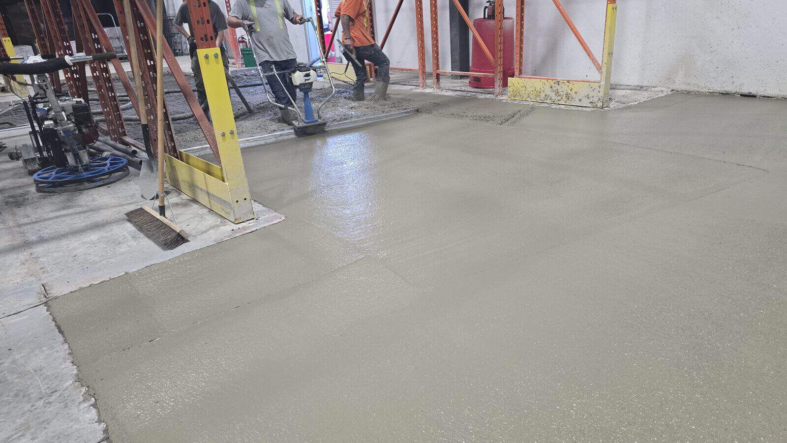 Completed warehouse concrete slab floor, smooth industrial finish