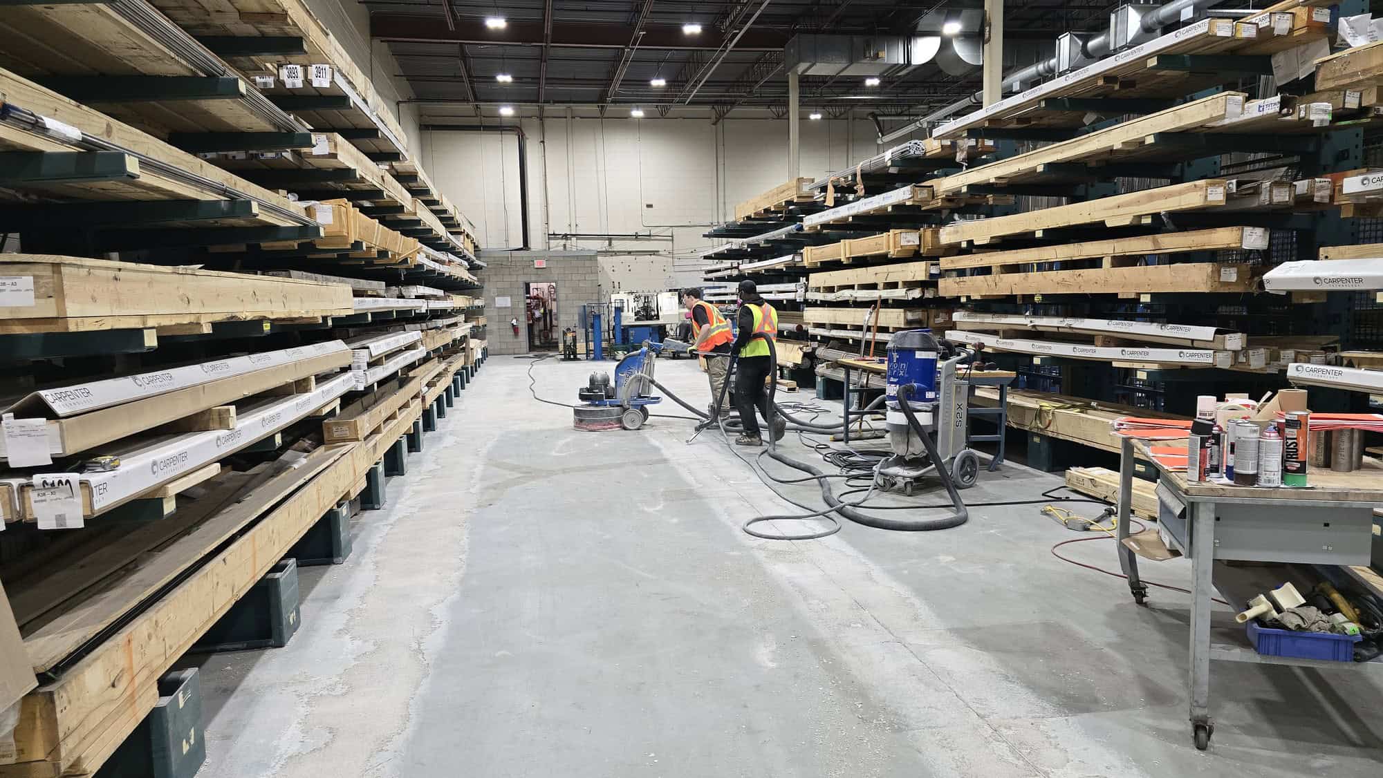 Diamond concrete grinding to prepare a warehouse slab for epoxy coating, Greater Montreal