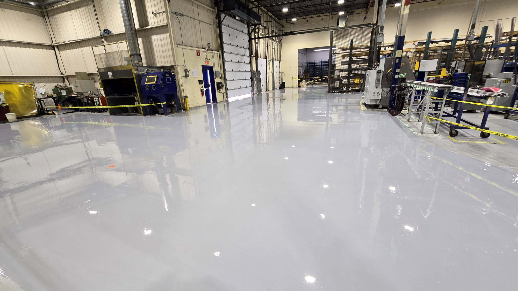 Finished epoxy coated industrial concrete floor in a distribution facility